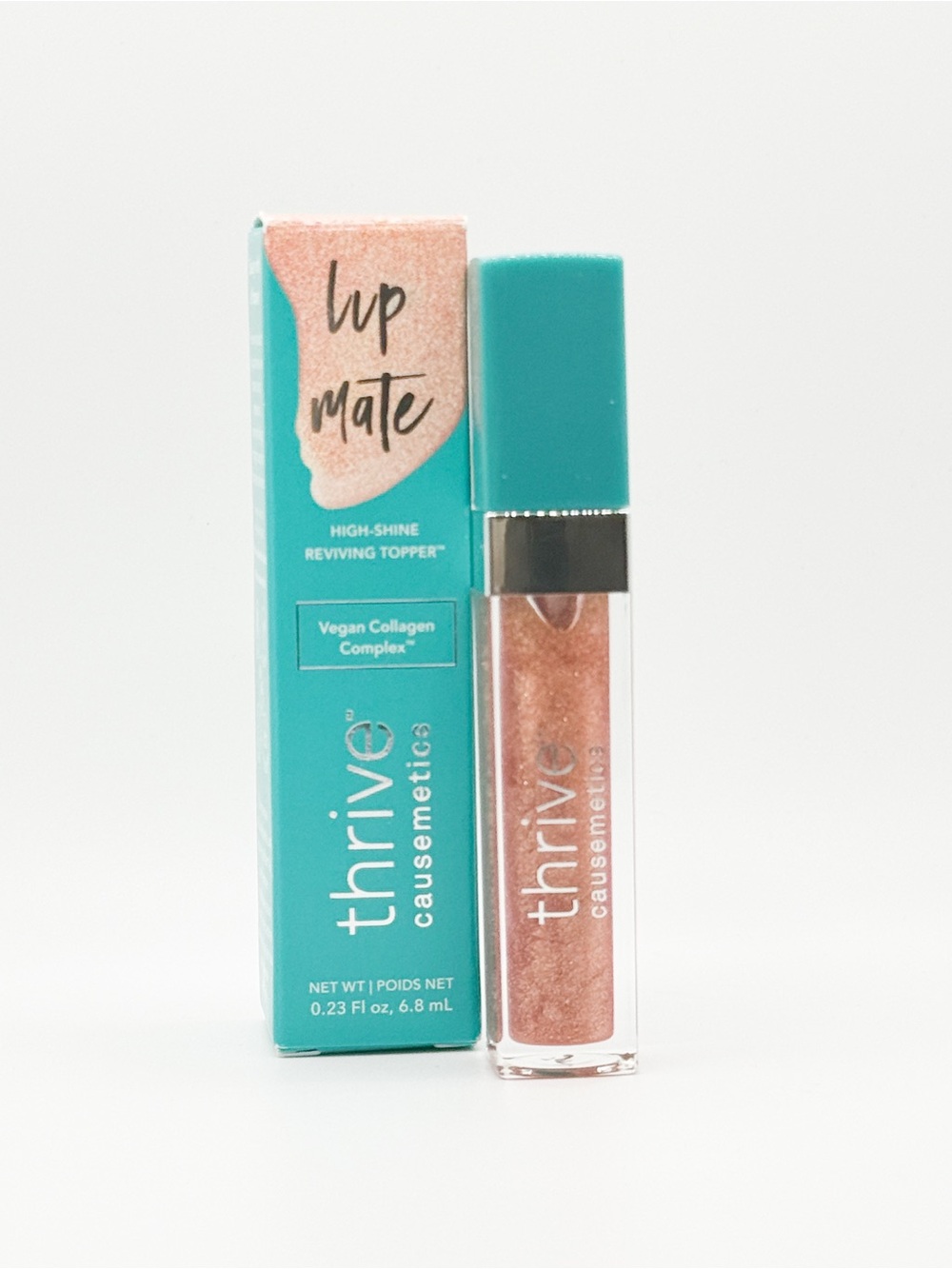 thrive causemetics Lip Mate High-Shine Reviving Topper in “Glinda”(Peachy)